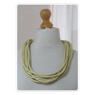 Cream, multi-strand, rubber necklace
