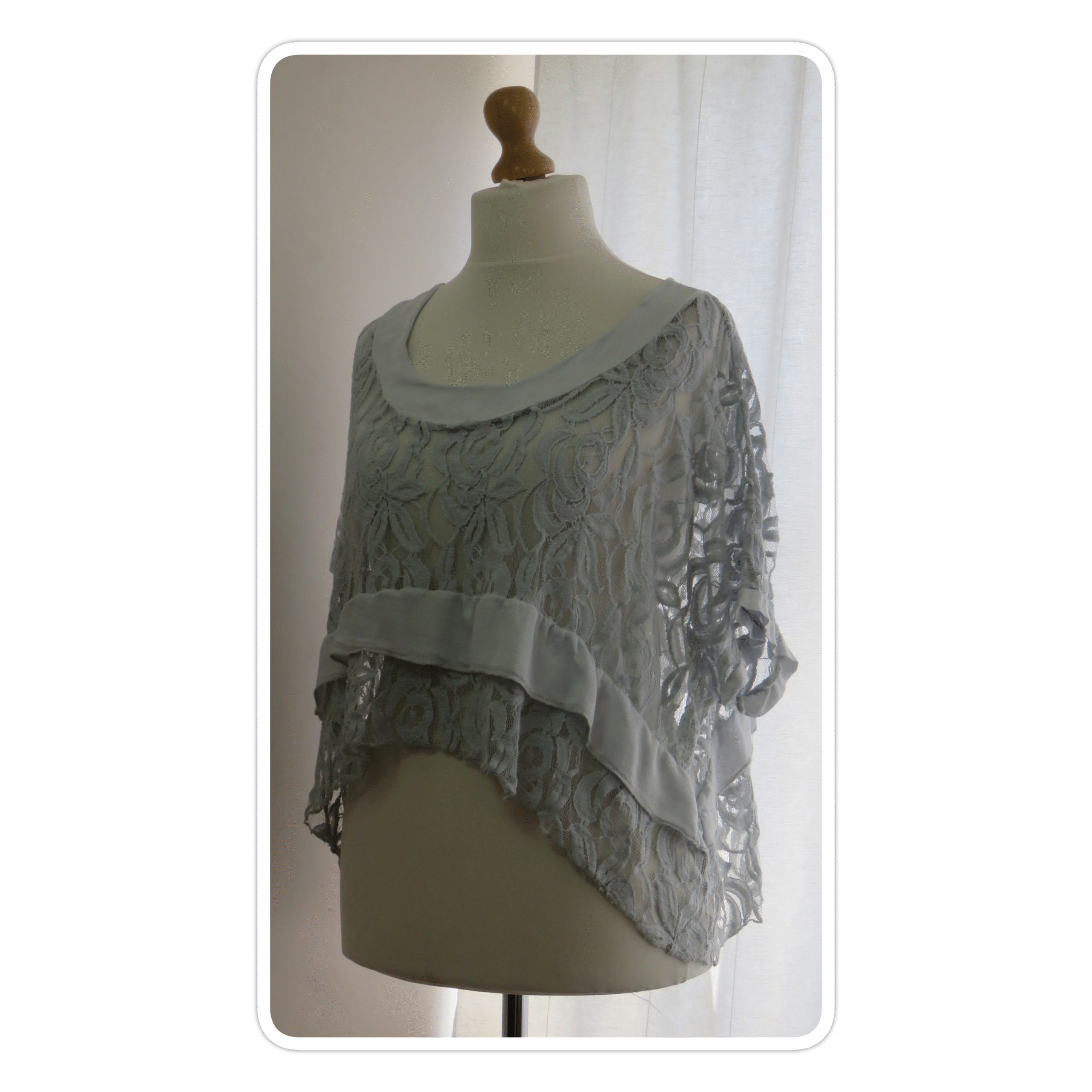 Silver grey, lace overtop